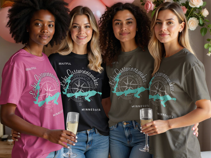 Four women wearing t-shirts with "Lake Ossawinnamakee, Minnesota" map design.