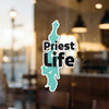 Priest Life sticker with a turquoise map outline on a glass surface.