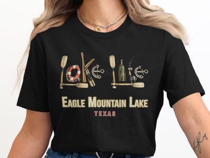 T-shirt with "Eagle Mountain Lake Texas" text and lake-themed graphics.