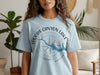 Light blue t-shirt with Woods Canyon Lake Arizona compass graphic.