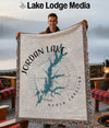 Woven blanket featuring a teal Jordan Lake map and compass on a neutral background.