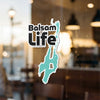 Balsam Life logo with a turquoise lake outline and copyright text.