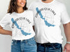 White t-shirts with Chautauqua Lake map and compass design.