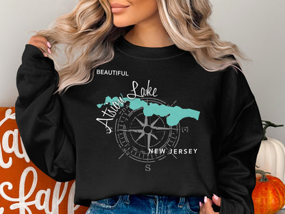 Black sweatshirt with "Beautiful Lake" and compass graphic, featuring New Jersey outline.