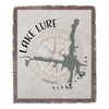 Woven blanket featuring Lake Lure North Carolina map and compass design.