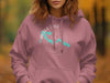 Pink hoodie with turquoise map of Alder Lake and compass design.
