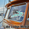 Mountain Island Life sticker on a boat window with Lake Lodge Media text.