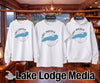 White sweatshirt, t-shirt, and hoodie with "Lake America" and US map graphic.