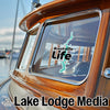 Brookville Life sticker on a boat window, with Lake Lodge Media text below.