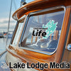 Charleston Life sticker on a boat window with Lake Lodge Media logo below.