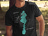 Black t-shirt with a teal compass rose design showing Barlow Lake, Michigan.