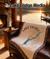 Blanket featuring a compass rose and silhouette of Lake George, New York.