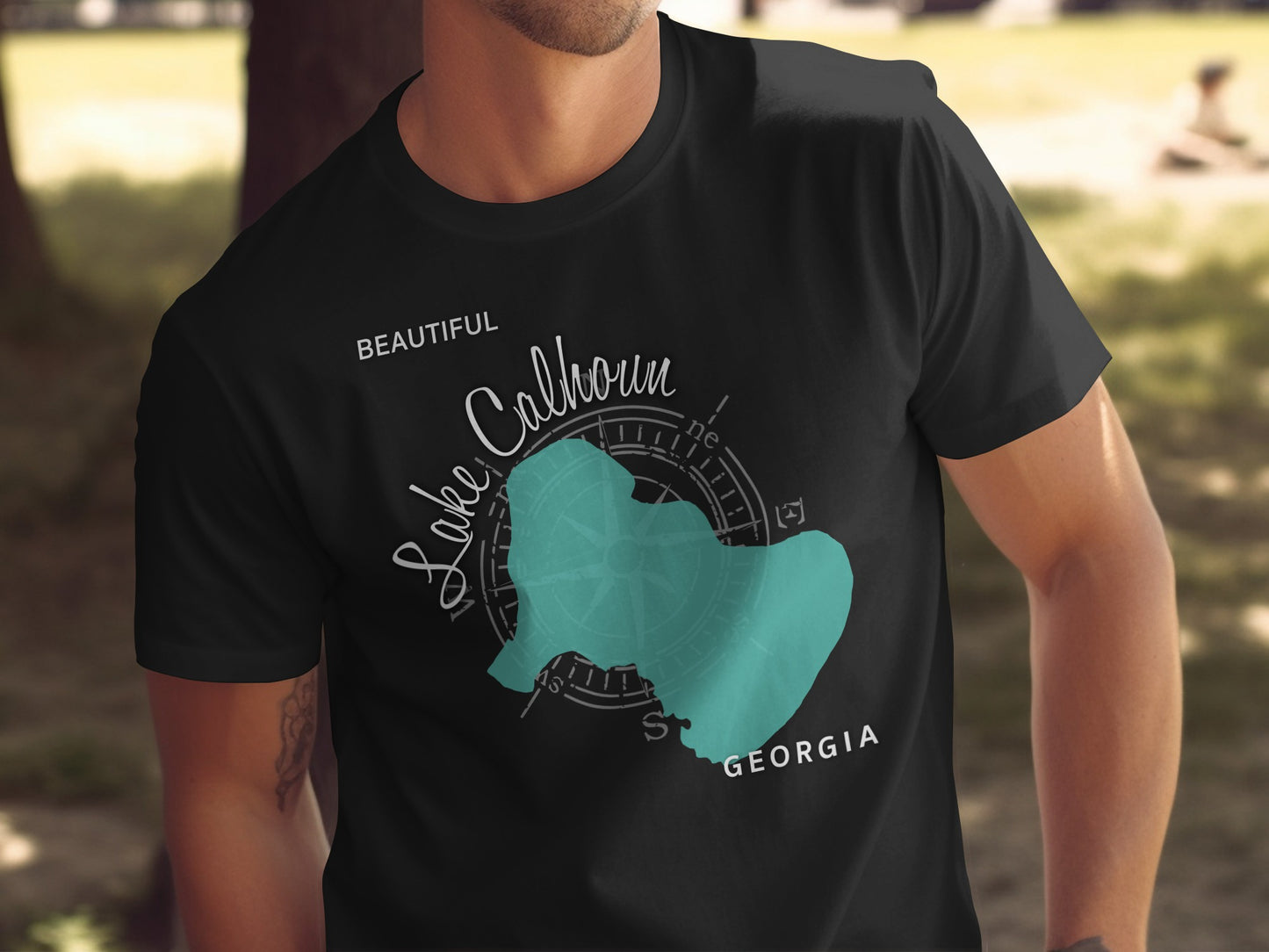 Black t-shirt with "Lake Calhoun GEORGIA" and compass rose map.