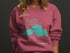 Pink sweatshirt with Lake Superior map and compass graphic.