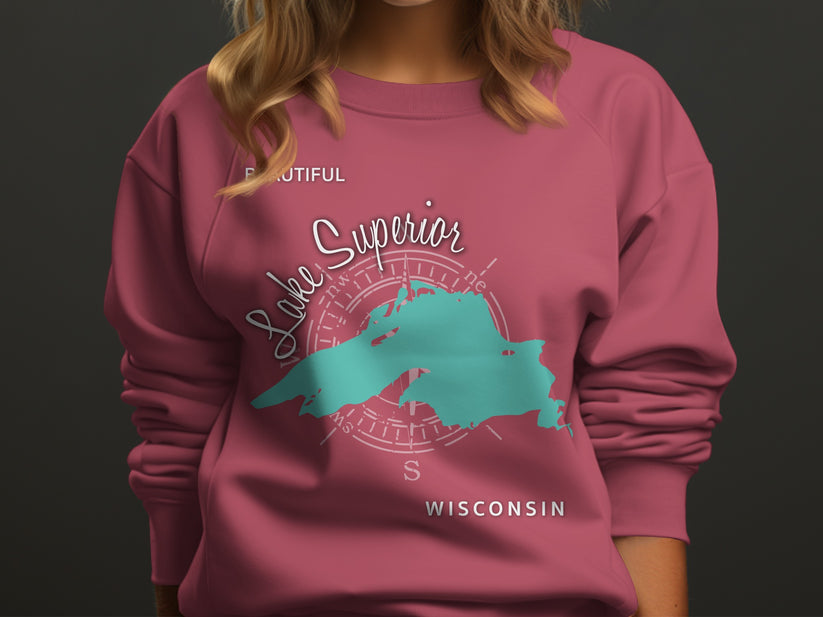 Pink sweatshirt with Lake Superior map and compass graphic.