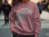 Pink sweatshirt with Logan Martin Lake, Alabama map and compass graphic.