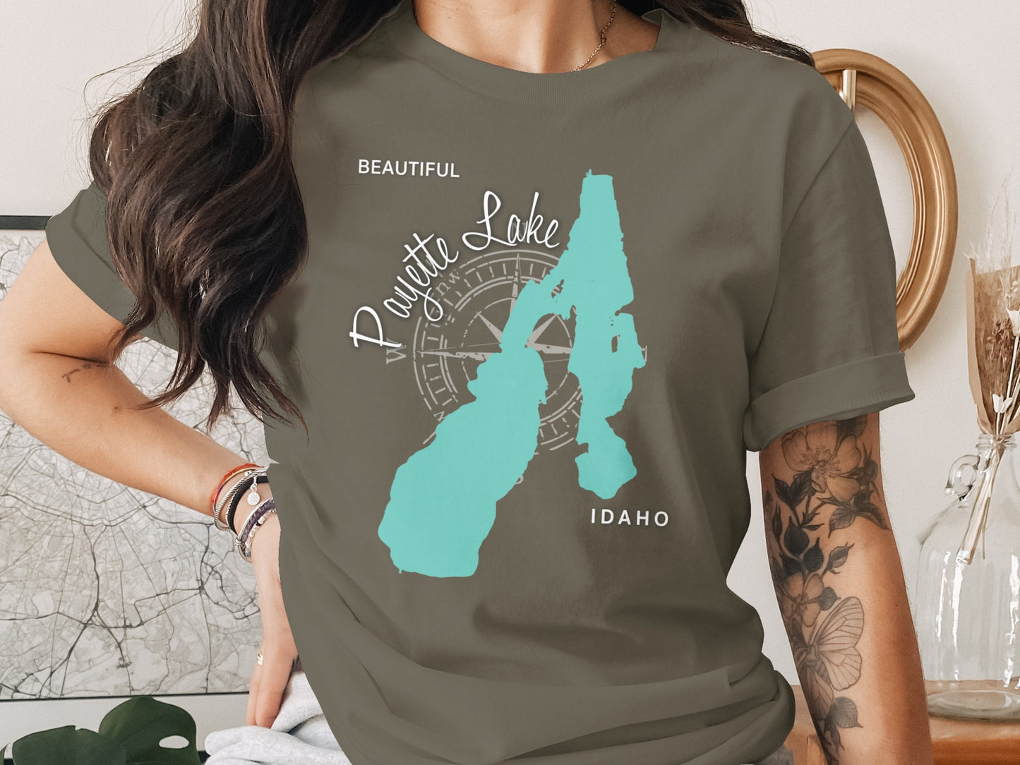 T-shirt with turquoise Payette Lake, Idaho map and compass graphic.