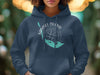Navy hoodie with "Sanibel Island Florida" and compass graphic.