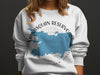 White sweatshirt with blue Manasquan Reservoir map graphic and "New Jersey" text.