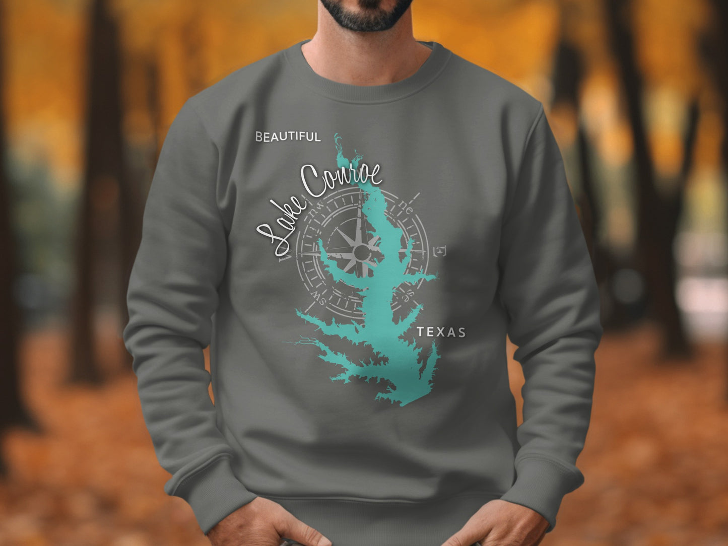 Grey sweatshirt with "Beautiful Lake Conroe Texas" and compass design.