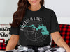 Black t-shirt with Pactola Lake South Dakota map and compass graphic.