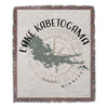 Woven blanket with Lake Kabetogama, Minnesota map and compass design.