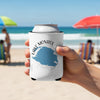 White koozie with Lake Monroe Florida map and compass graphic held on beach.