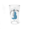 Clear glass pint glass with Calcasieu Lake map and compass design.