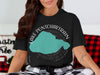 Black t-shirt with "Lake Pontchartrain Louisiana" graphic and teal lake shape.