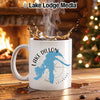 White mug with Lake Dillon Colorado map and compass graphic, steaming coffee.