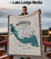 Woven blanket with teal Lake Marion map design and compass rose.