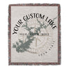 Woven blanket with text "YOUR CUSTOM LAKE YOUR STATE" and custom image design.