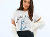 White t-shirt with Smithville Lake Missouri map and compass design.