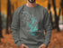 Gray sweatshirt with Lake Norman, North Carolina map and compass design.