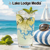 Glass with Lake Texoma map and compass design on a beach background.