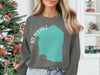 Grey sweatshirt with turquoise Red Lake Minnesota map graphic and compass details.