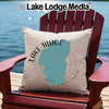 Pillow with Lake Tahoe map shape and compass rose on Adirondack chair.