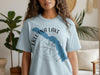 Light blue t-shirt with Eklutna Lake and Alaska text over a compass rose design.