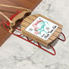 Wooden sled ornament with "Merry Christmas" and Mark Twain Lake map.