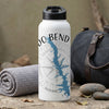 White water bottle with "DO BEND" text and blue lake shape on compass rose graphic.