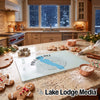 Glass cutting board featuring a map of Pavlas Lake, Wisconsin, centered on a baking-themed kitchen counter.