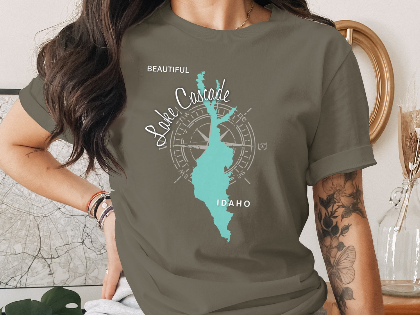 Lake Cascade Idaho map and compass design on a muted green t-shirt.