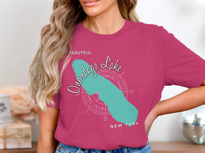 Onondaga Lake map graphic with compass rose and "New York" text on a pink t-shirt.