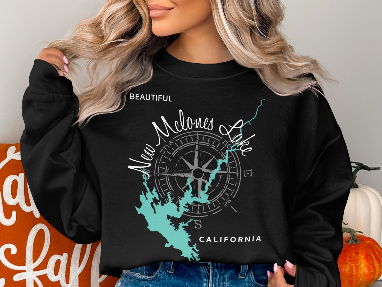 Black sweatshirt with "New Melones Lake California" and compass rose graphic.