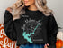 Black sweatshirt with "New Melones Lake California" and compass rose graphic.