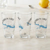 Three clear glasses feature Rathbun Lake Iowa map and compass design.