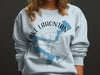 Light blue sweatshirt with "Lake Lahontan Nevada" graphic and compass rose design.