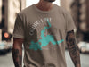 Caddo Lake Texas map graphic on a tan t-shirt with compass and text.