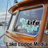 Tobesofkee Life logo superimposed on a wooden boat window and "Lake Lodge Media" text.