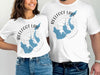 T-shirts with "Reelfoot Lake Tennessee" print and compass graphic.